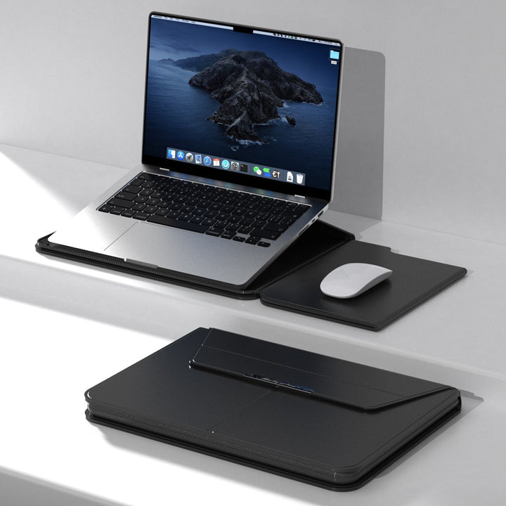 Black Laptop sleeve with Zipper open, laptop propped on the fold-out stand half beside a mouse on the built-in mouse pad half