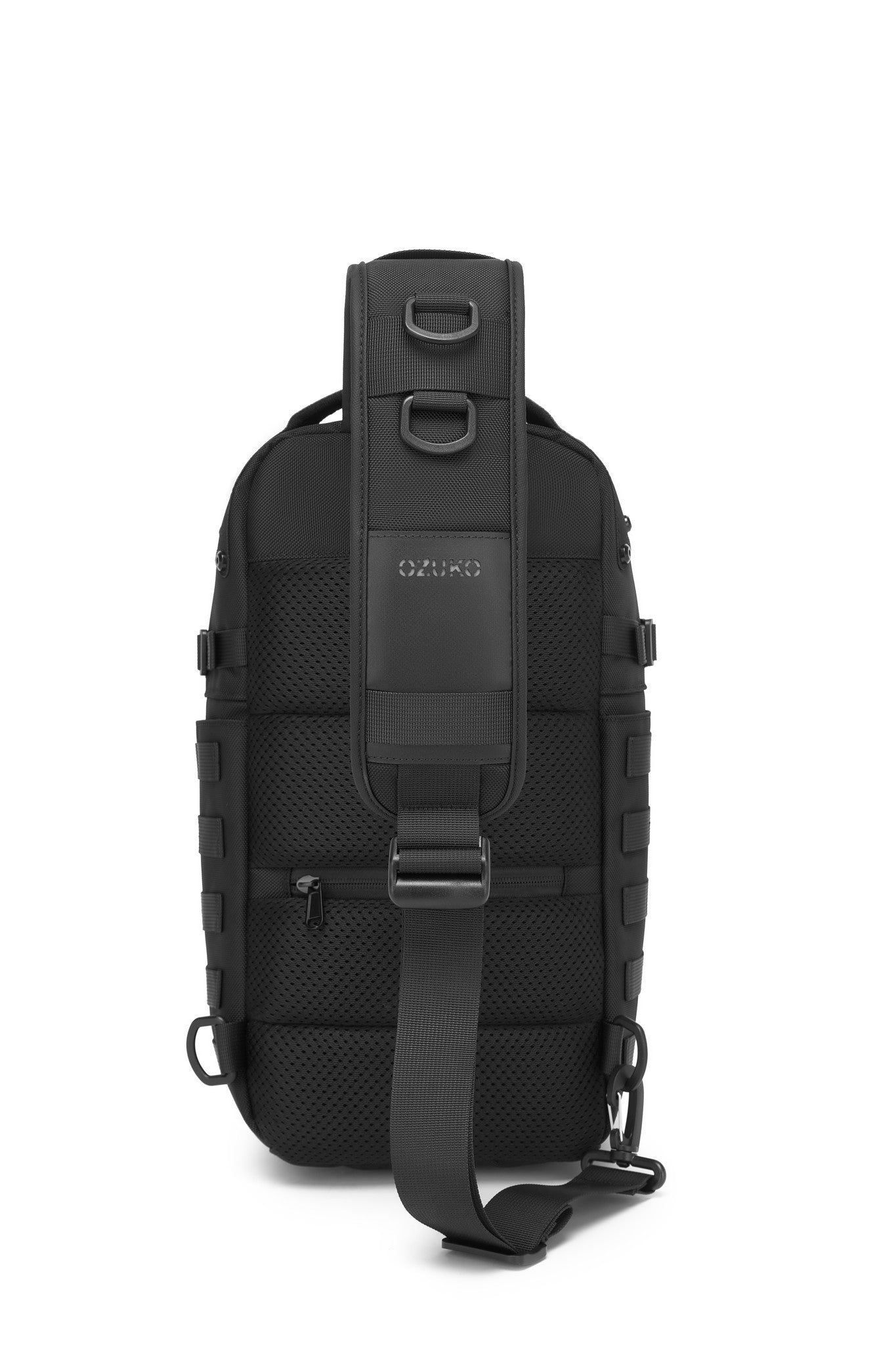 Daytrip Backpack 12L in Black - close-up of the strap card slot with a card tucked inside, next to the OZUKO branding