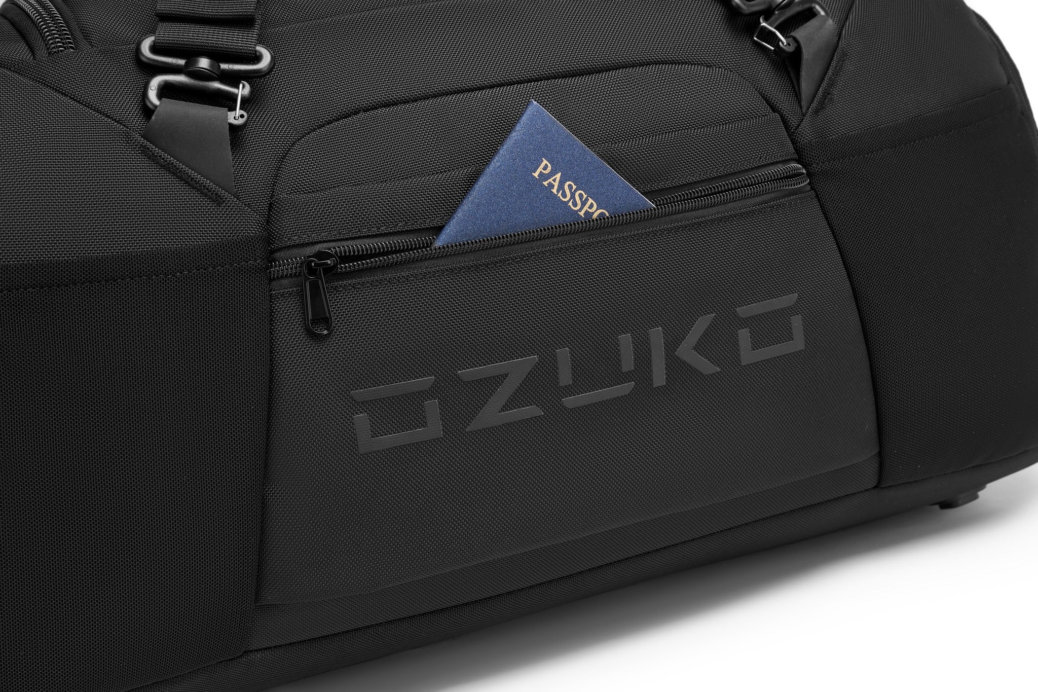 Close-up of the zippered passport pocket with a passport tucked inside