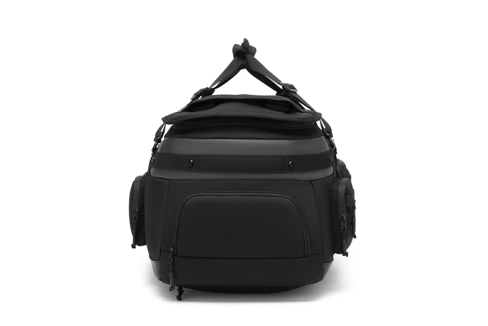 Oono Voyager Duffel 50L in black, side view showing the structured base and side carry handle