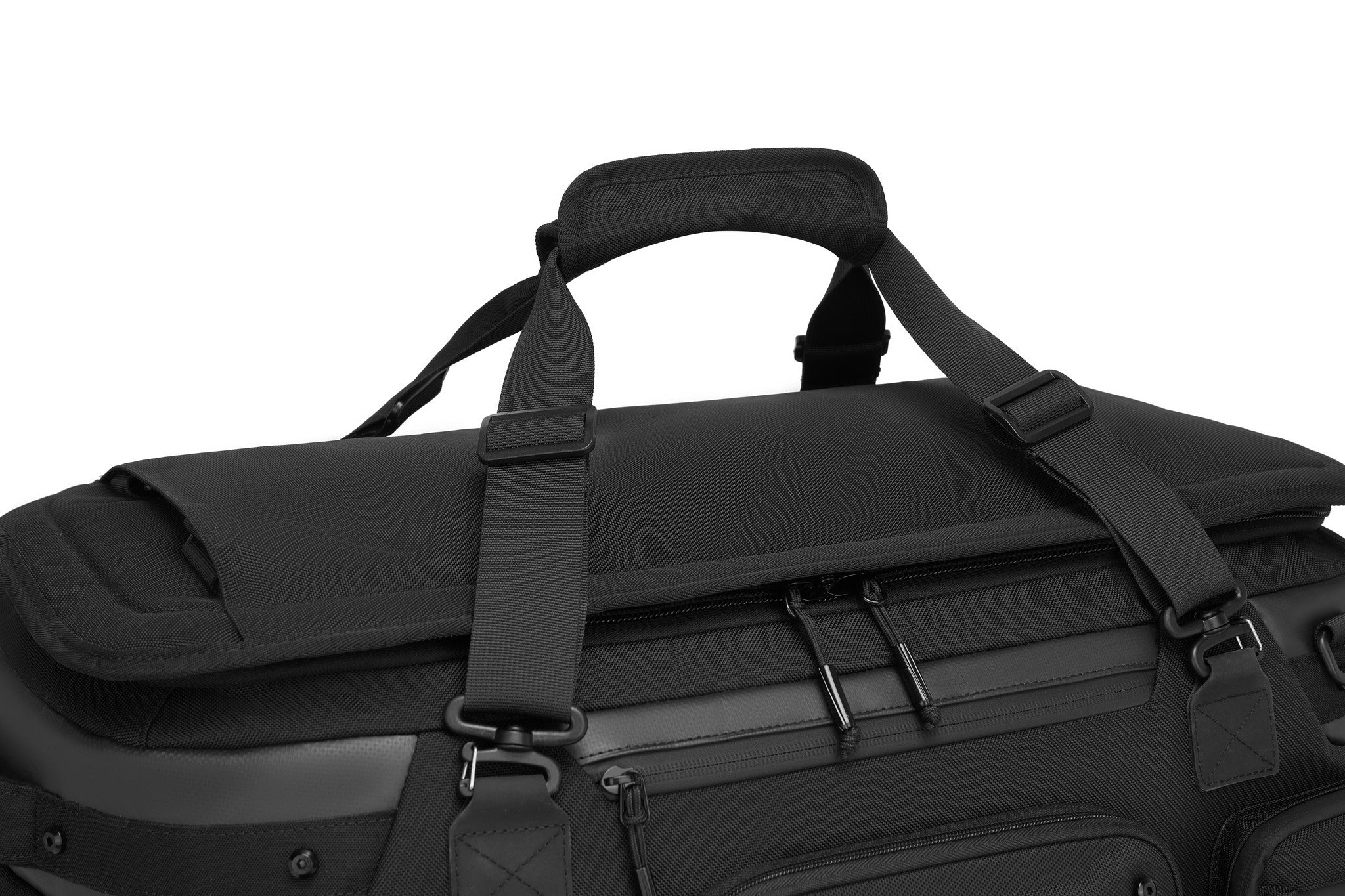 Close-up of the Oono Voyager Duffel 50L's padded top carry handle and adjustable shoulder strap