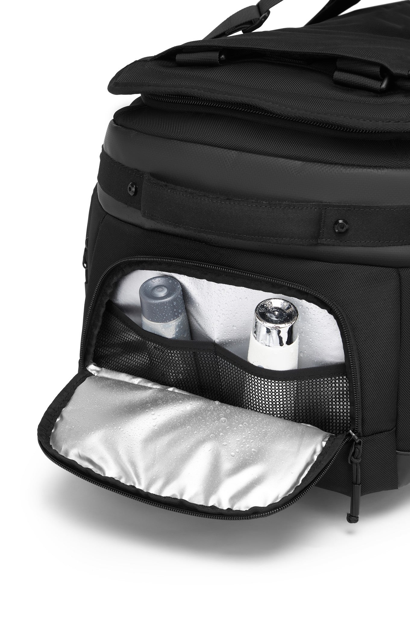 Oono Voyager Duffel 50L side toiletry pocket open, showing the water-resistant lining and travel bottles