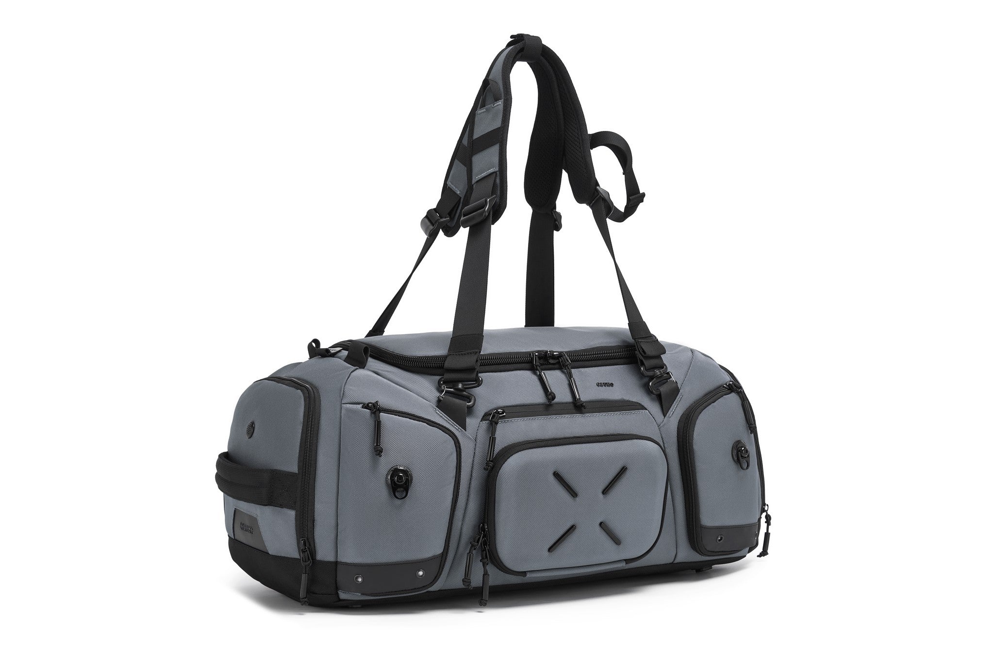 Gray Voyager Duffel 40L, three-quarter angled view with the padded backpack straps deployed and front compression pocket visible