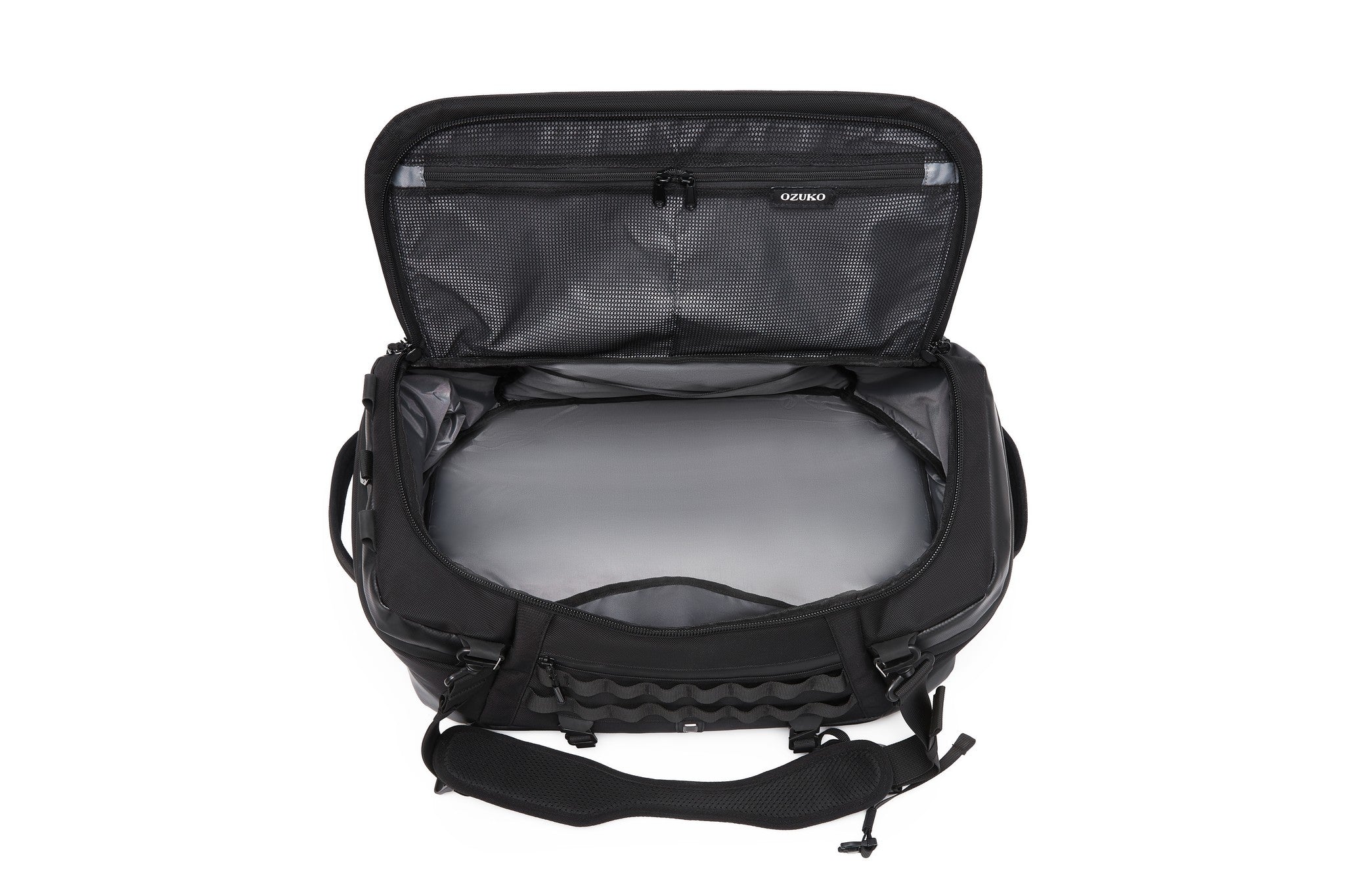 Overhead view of the empty main compartment interior with coated lining and mesh lid pocket