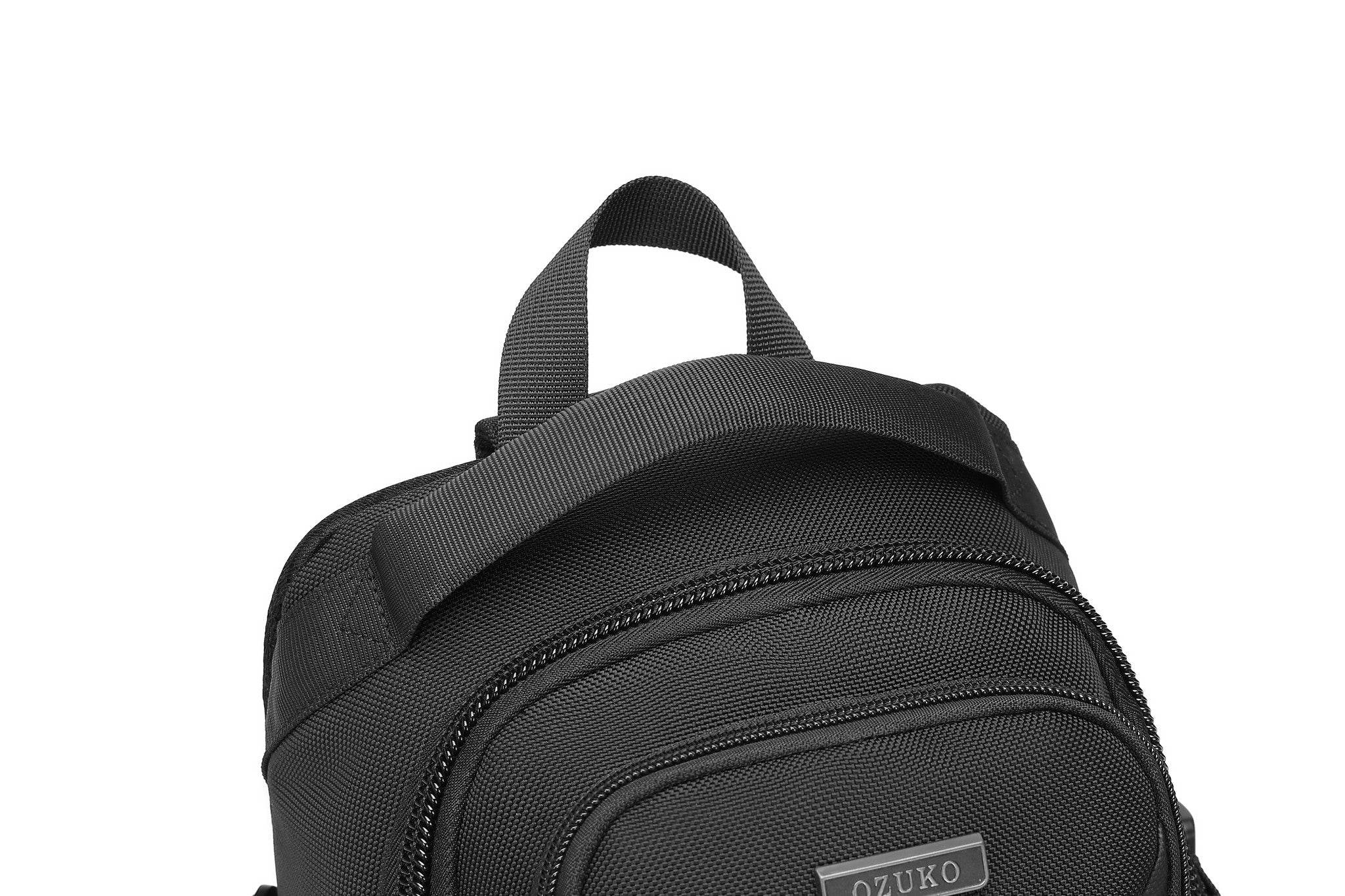 Ridge Sling 8L in Black, close-up of the top carry handle